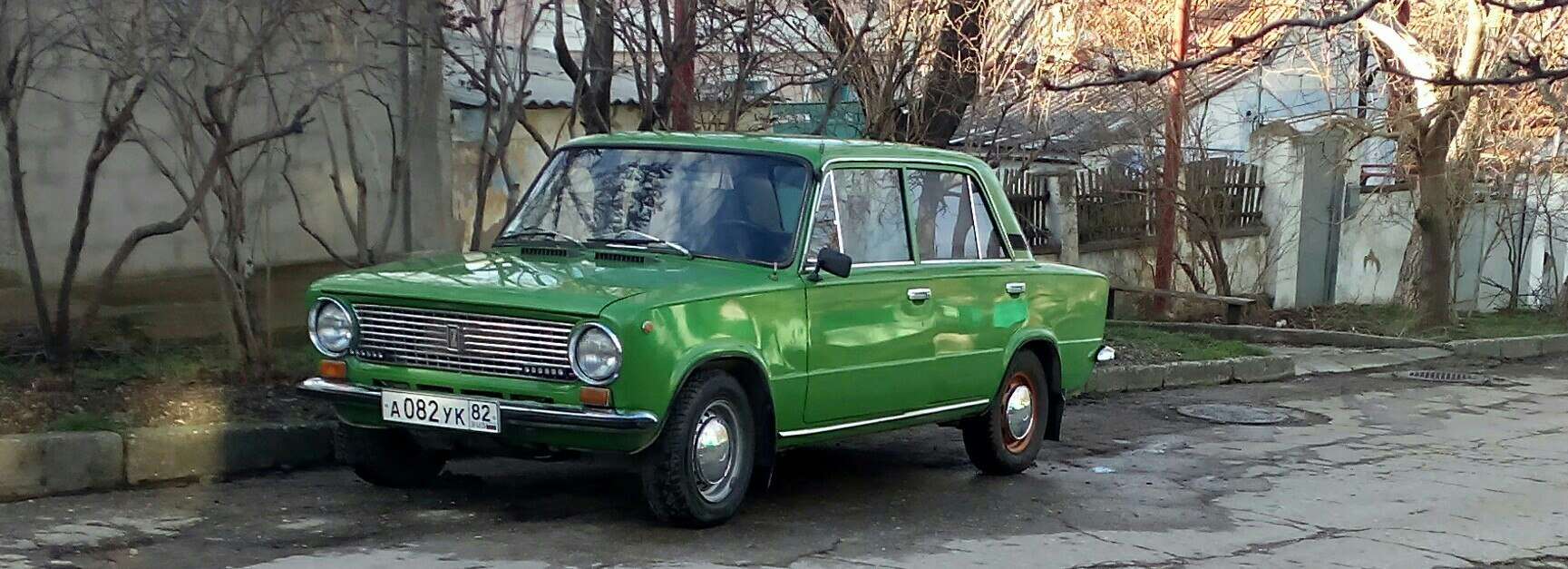 Фотография номера А082УК 82
